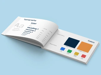 open faced book displaying graphic design elements